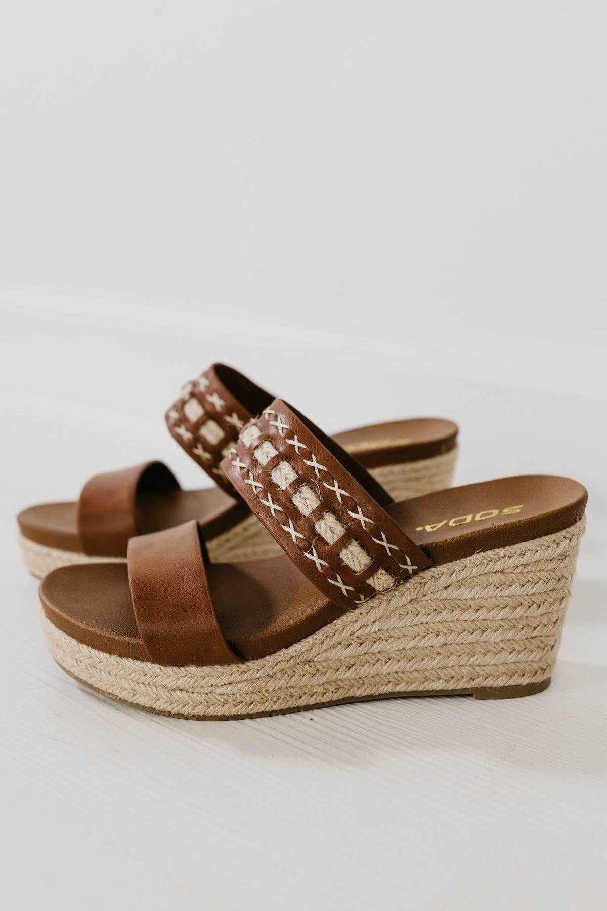 The Bow Platform Wedge Sandal