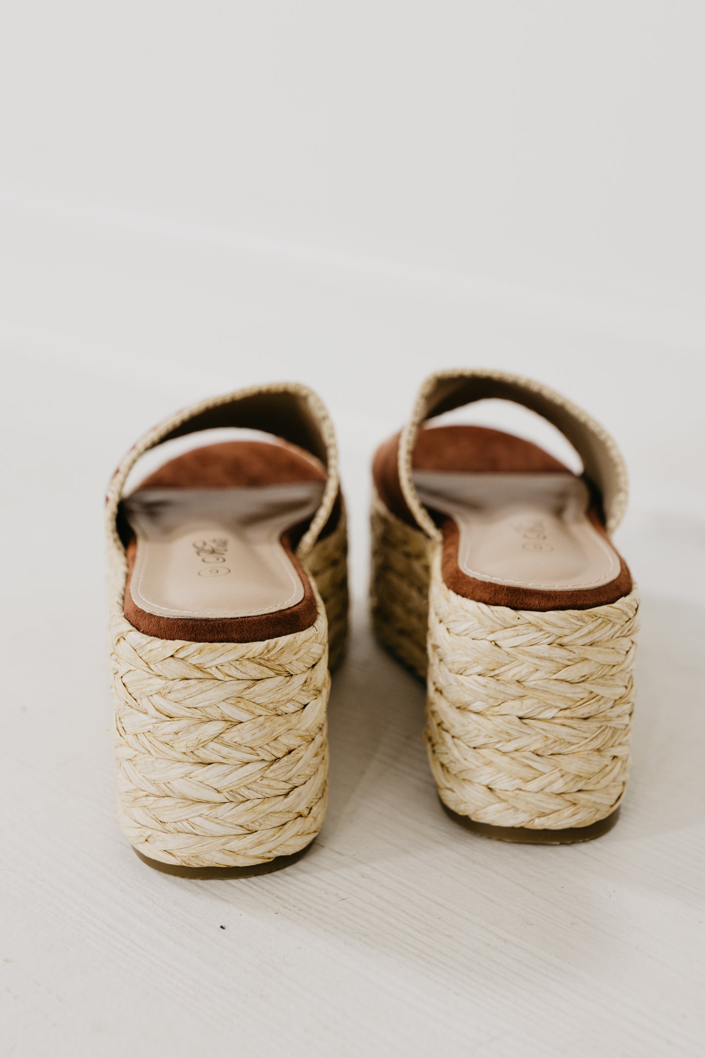 The Gemini Raffia Stitch Platform Sandal