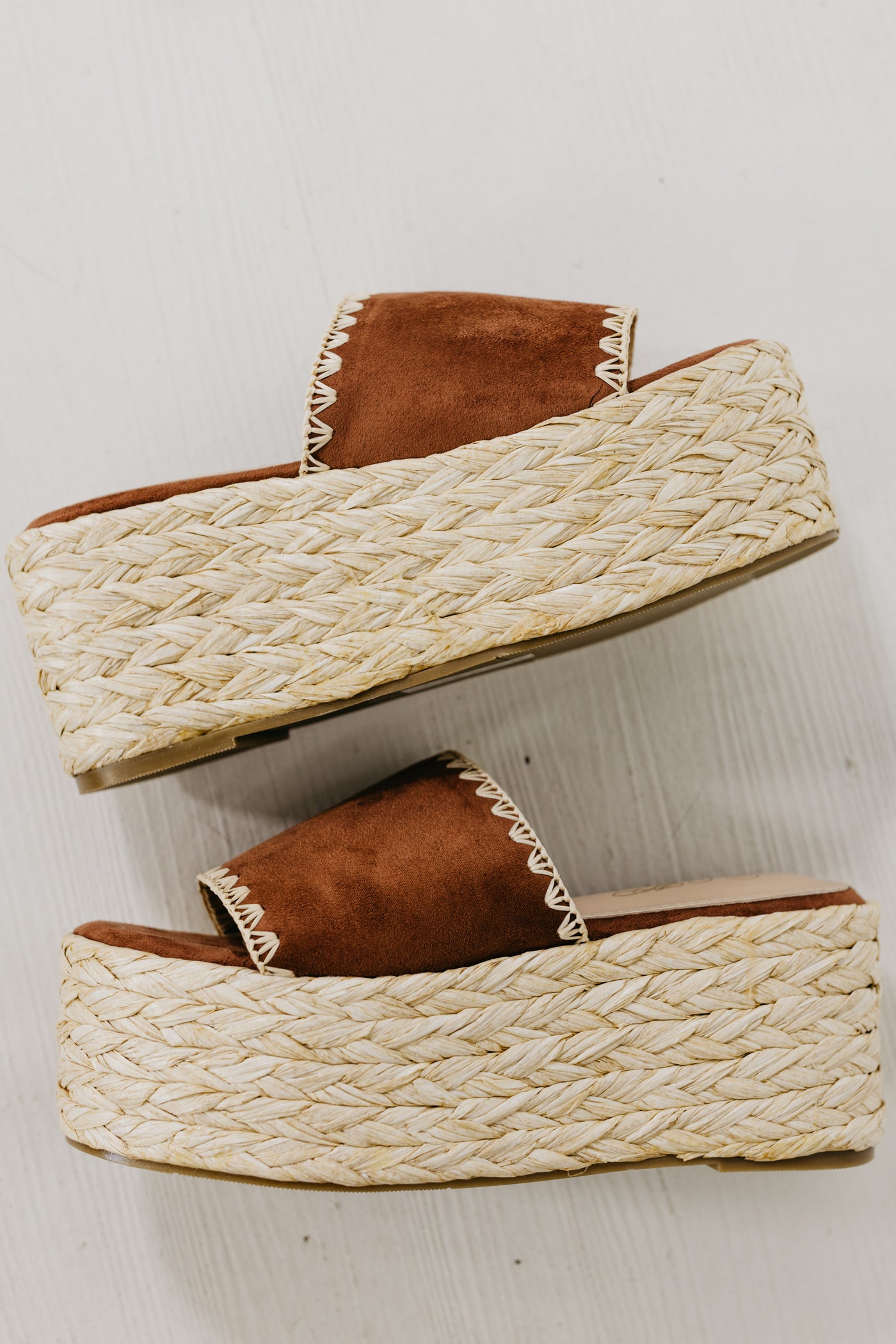 The Gemini Raffia Stitch Platform Sandal