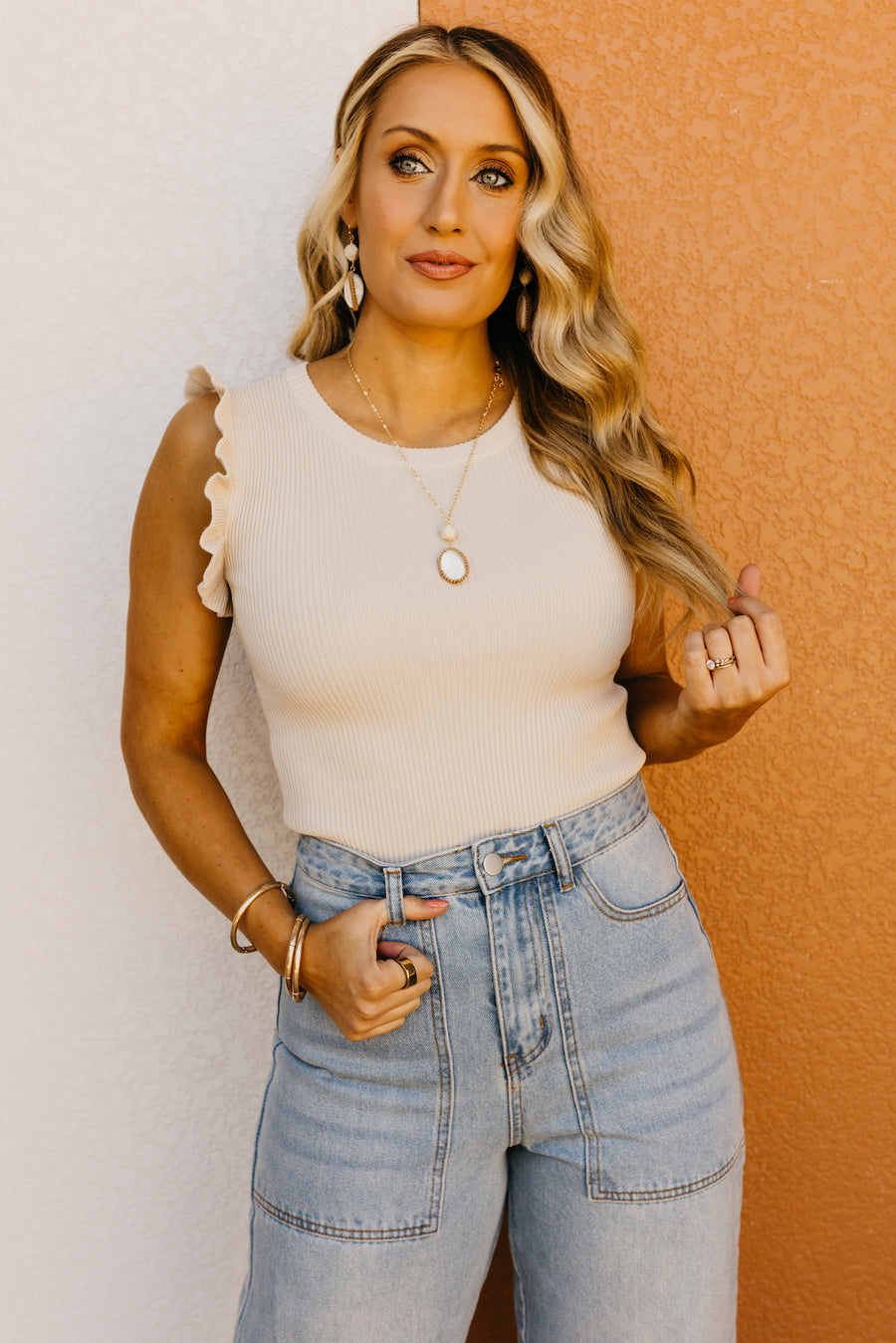 The Allie Ruffle Sleeveless Sweater Top