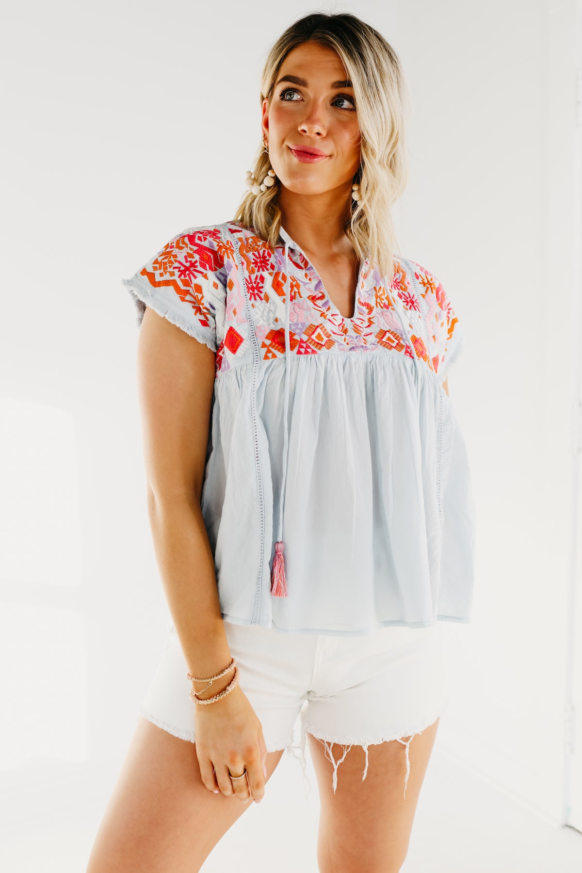 Emily's Solid Pom Pom Trim Babydoll Tunic Top – Vanilla Bay