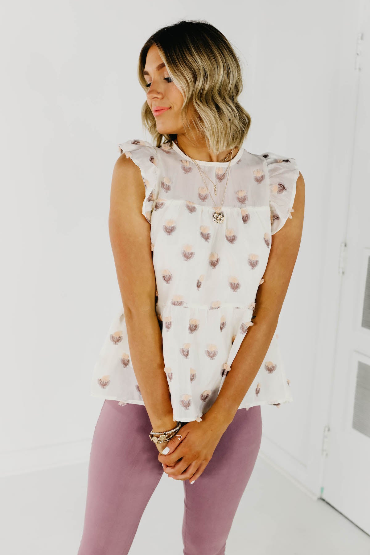 The Durant Flutter Sleeve Tiered Blouse