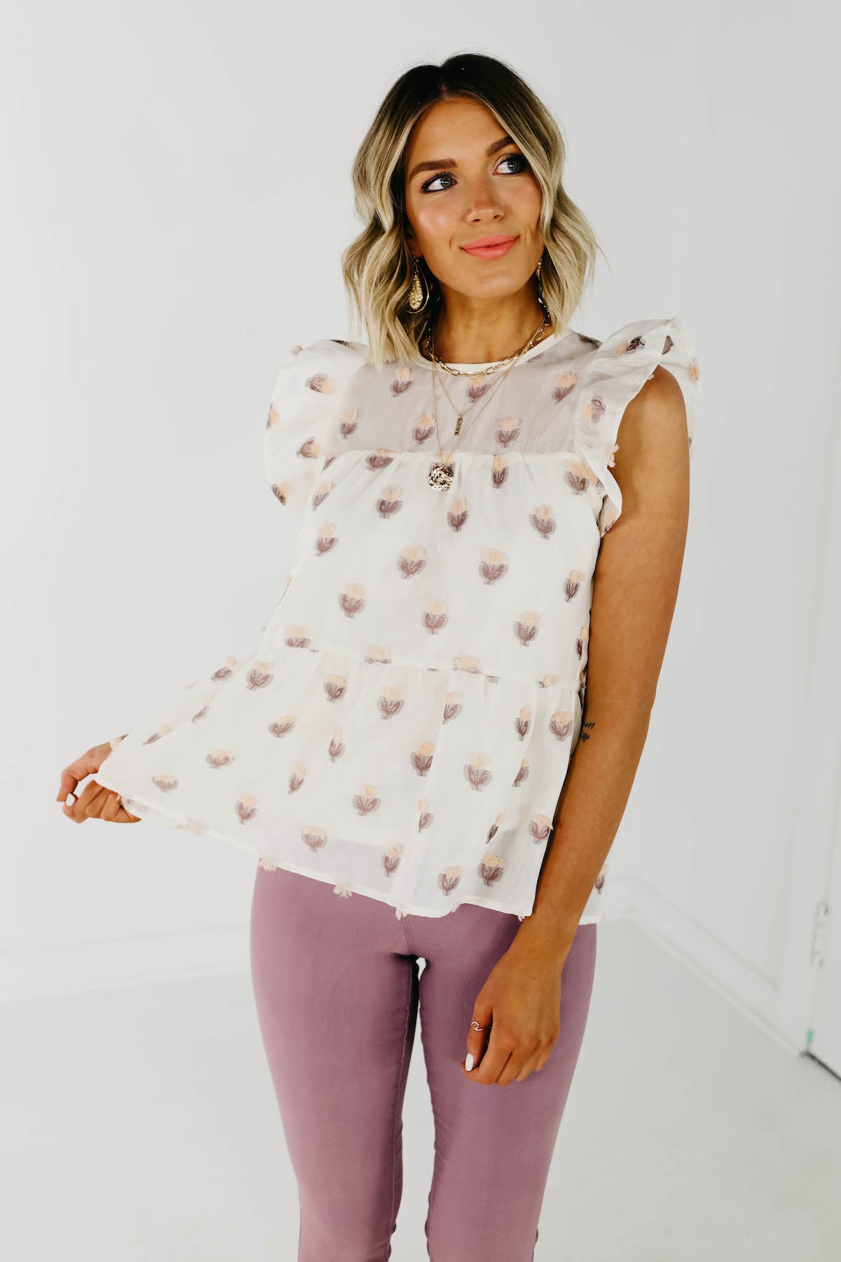 The Durant Flutter Sleeve Tiered Blouse